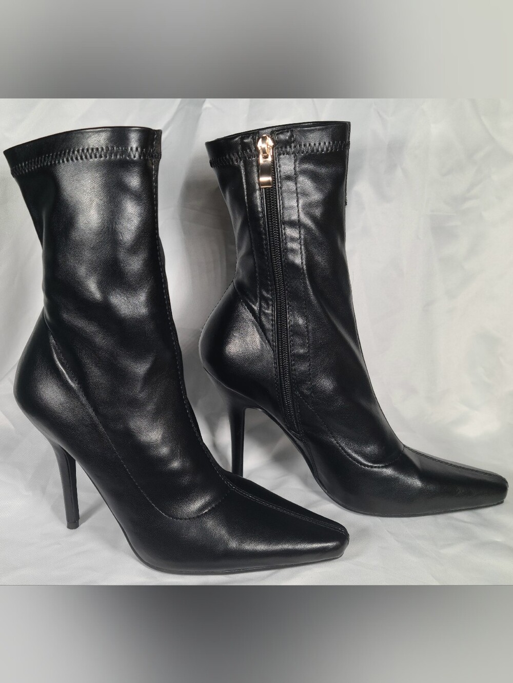 Sleek Black Pointed Toe Stiletto Ankle Boots with Side Zip